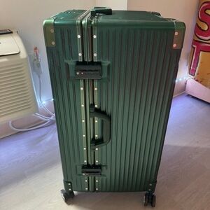 Metal green suitcase